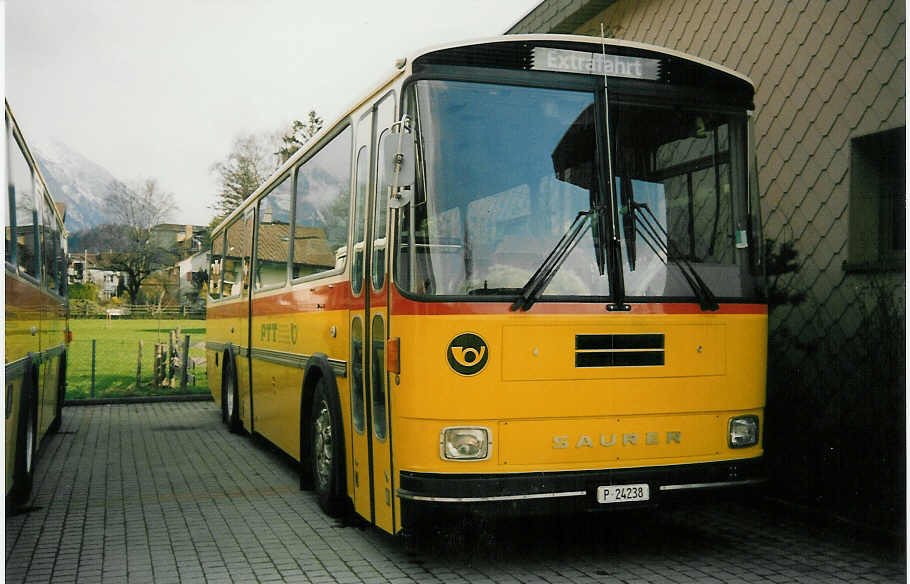 (016'800A) - PTT-Regie - P 24'238 - Saurer/T�scher am 29. M�rz 1997 in Meiringen, Garage