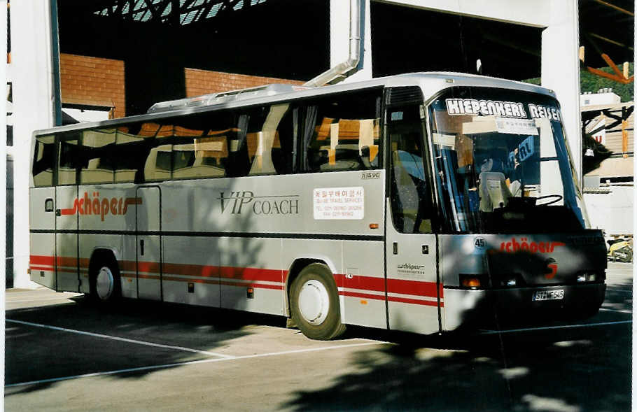 (049'023) - Aus Deutschland: Sch�pers, Nordwale - Nr. 45/ST-WF 545 - Neoplan am 13. August 2001 in Thun, Grabengut