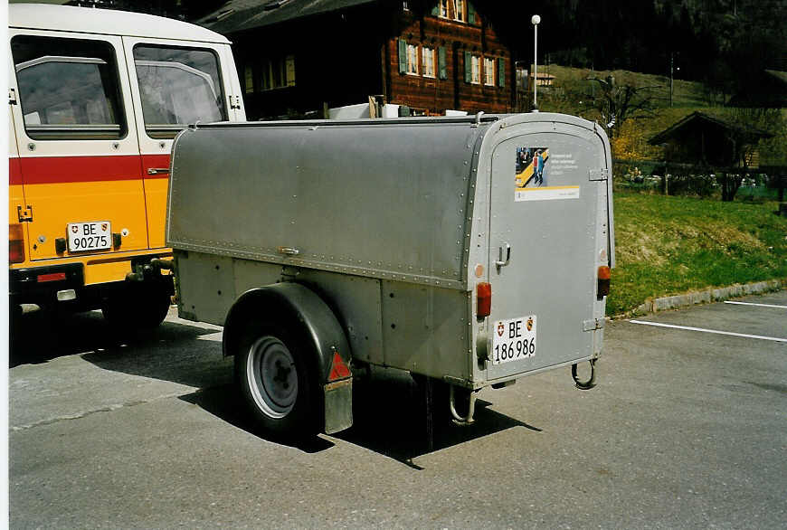 (052'714) - Portenier, Adelboden - Nr. 2/BE 186'986 - Hess/PTT Gep�ckanh�nger (ex Geiger, Adelboden Nr. 2; ex P 2795) am 1. April 2002 in Kiental, Garage 