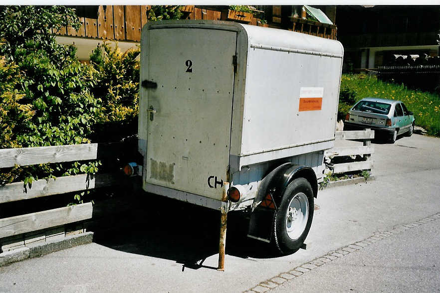 (053'522) - Pieren, Adelboden - Nr. 2 - Aebi Gep�ckanh�nger (ex AFA Adelboden Nr. 2) am 26. Mai 2002 in Adelboden, Mineralquelle