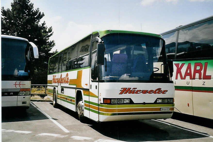 (061'319) - H�rzeler, Dietikon - Nr. 2/ZH 444'523 - Neoplan am 7. Juli 2003 beim Bahnhof Interlaken West