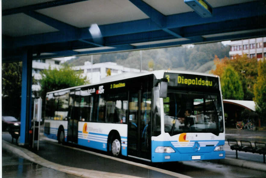 (063'905) - RTB Altst�tten - Nr. 35/SG 131'724 - Mercedes am 9. Oktober 2003 beim Bahnhof Heerbrugg