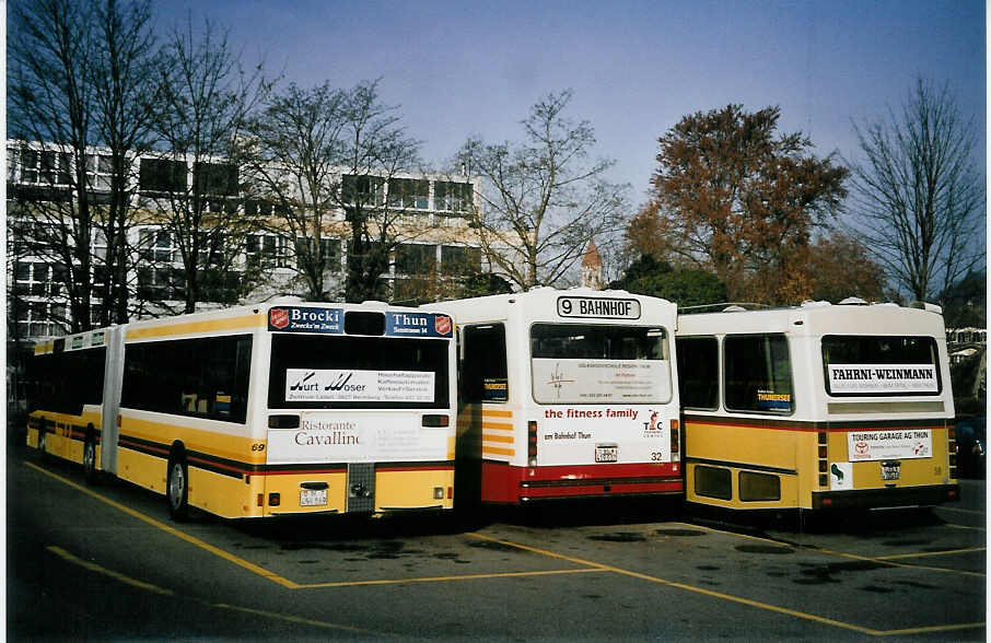 (064'435) - STI Thun - Nr. 69/BE 456'869 - MAN am 10. Dezember 2003 bei der Schiffl�ndte Thun