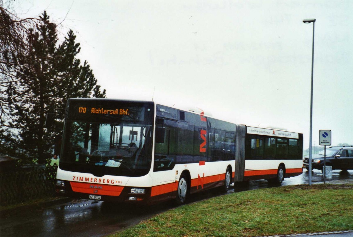 (122'717) - Bamert, Wollerau - SZ 24'744 - MAN (ex Vorf�hrfahrzeug) am 10. Dezember 2009 beim Bahnhof Samstagern