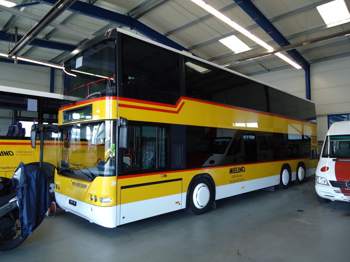 (128'060) - Wieland, Murten - Nr. 30 - Neoplan (ex Rey, Ayent; ex Ersatz- und Vorf�hrfahrzeug) am 26. Juli 2010 in Murten, Garage