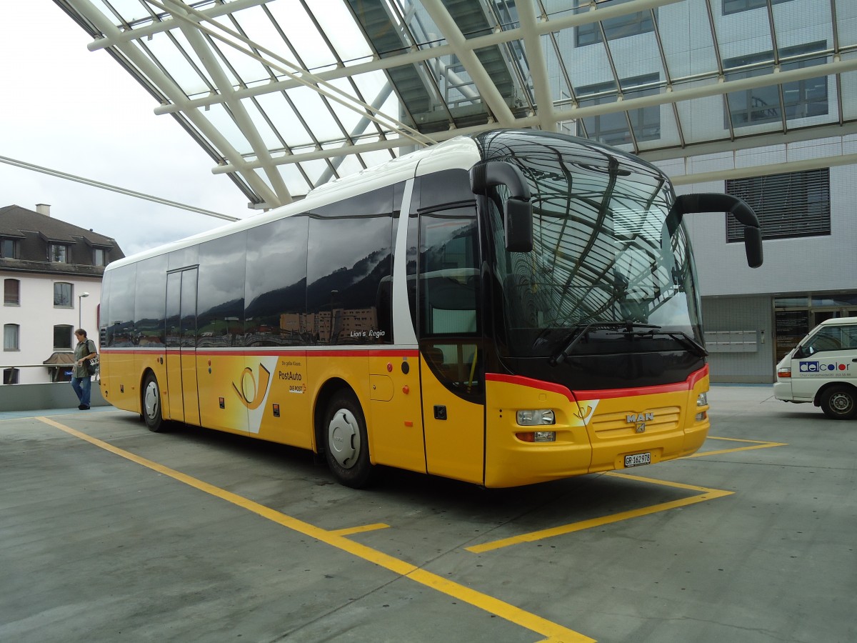 (128'701) - PostAuto Graub�nden - GR 162'978 - MAN am 13. August 2010 in Chur, Postautostation