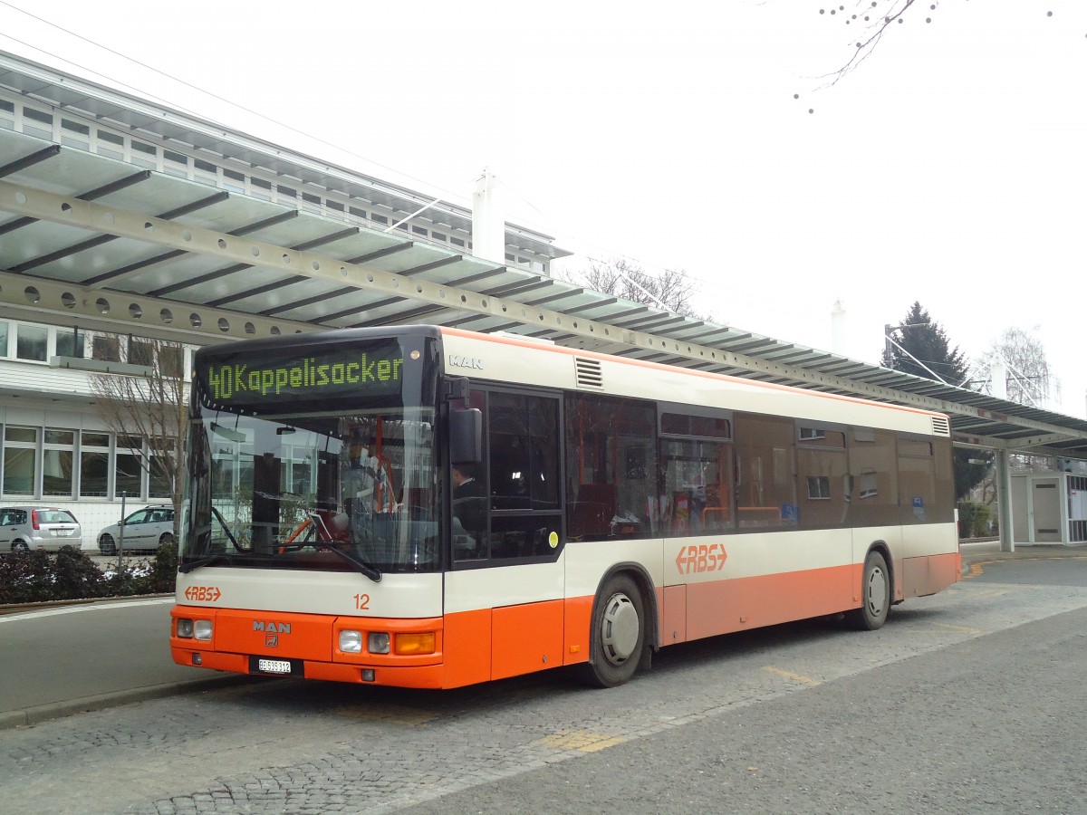 (132'424) - RBS Worblaufen - Nr. 12/BE 535'312 - MAN am 24. Januar 2011 beim Bahnhof Papierm�hle