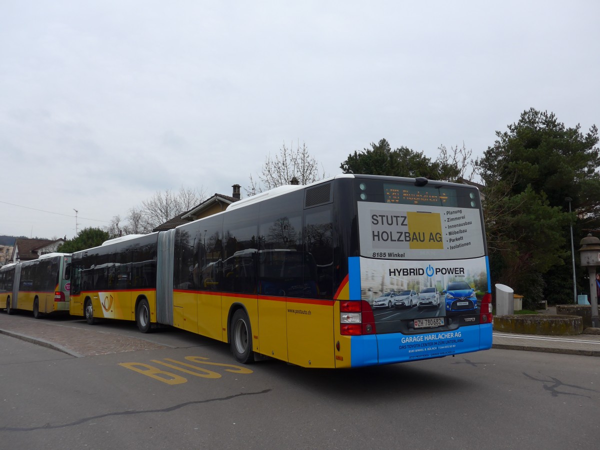 (168'884) - PostAuto Z�rich - Nr. 313/ZH 780'682 - MAN am 24. Februar 2016 beim Bahnhof B�lach