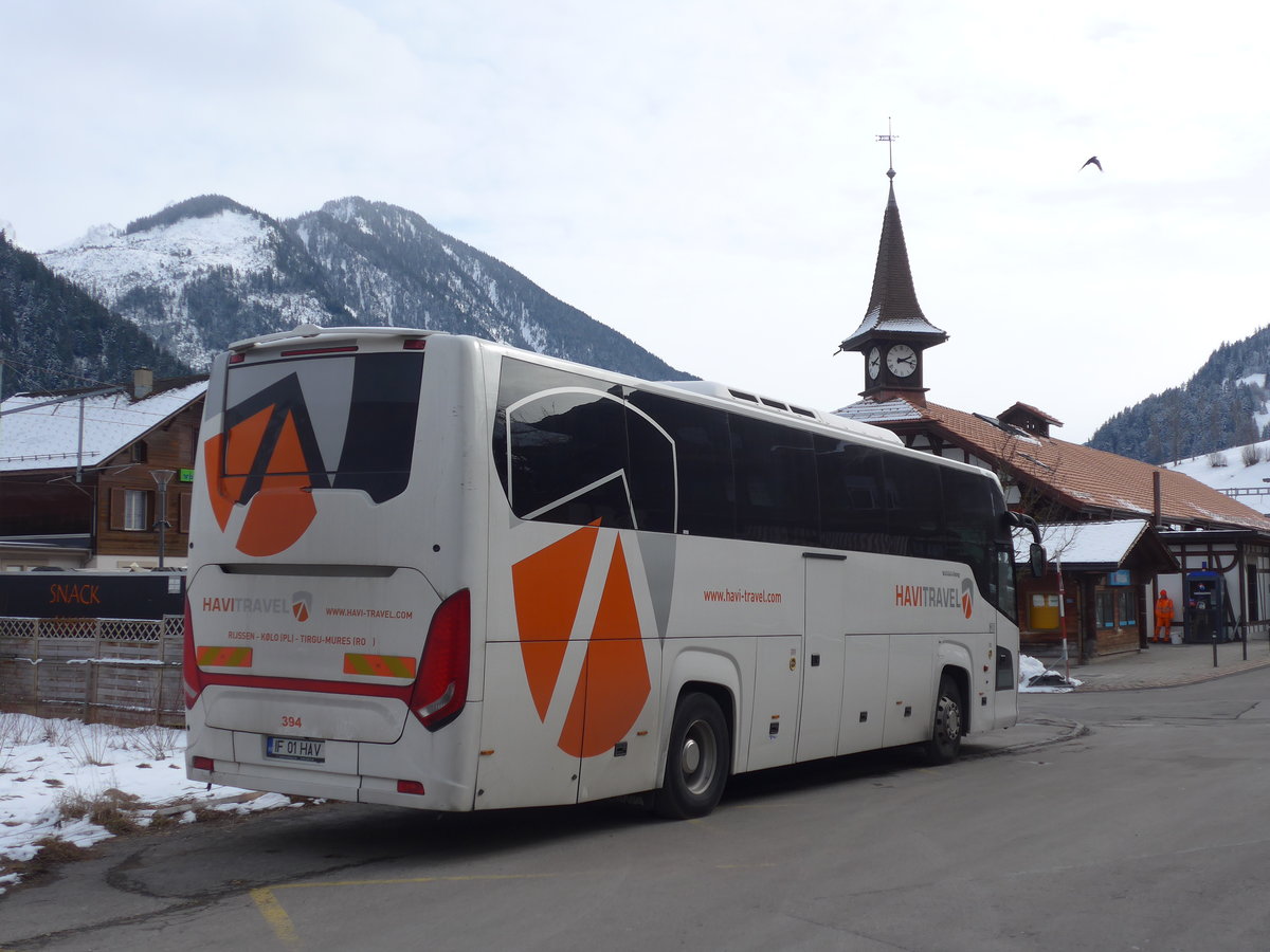 (188'198) - Aus Rum�nien: Havi Travel, Turgu-Mures - Nr. 394/IF 01 HAV - Scania/Higer am 4. Februar 2018 beim Bahnhof Zweisimmen