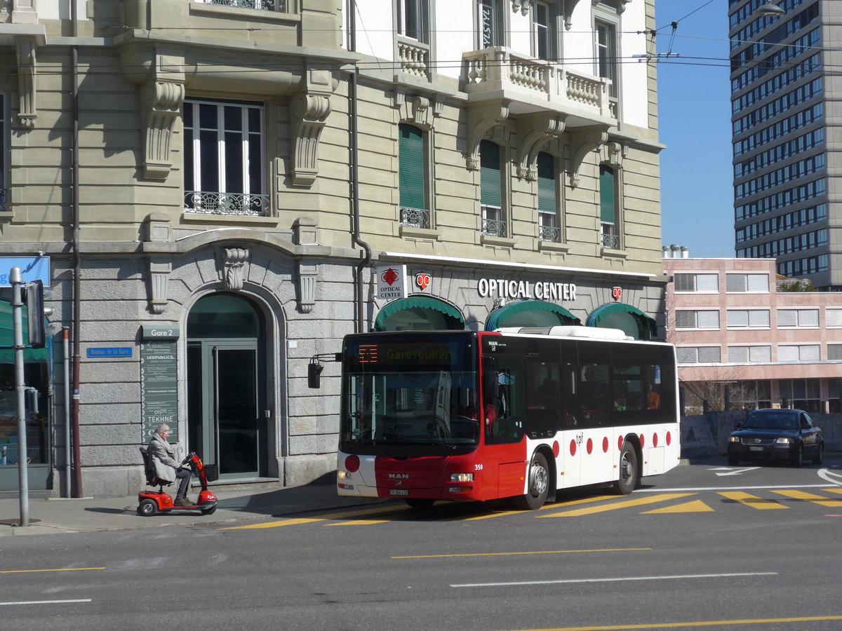(203'258) - TPF Fribourg - Nr. 350/FR 300'418 - MAN/G�ppel am 24. M�rz 2019 beim Bahnhof Fribourg