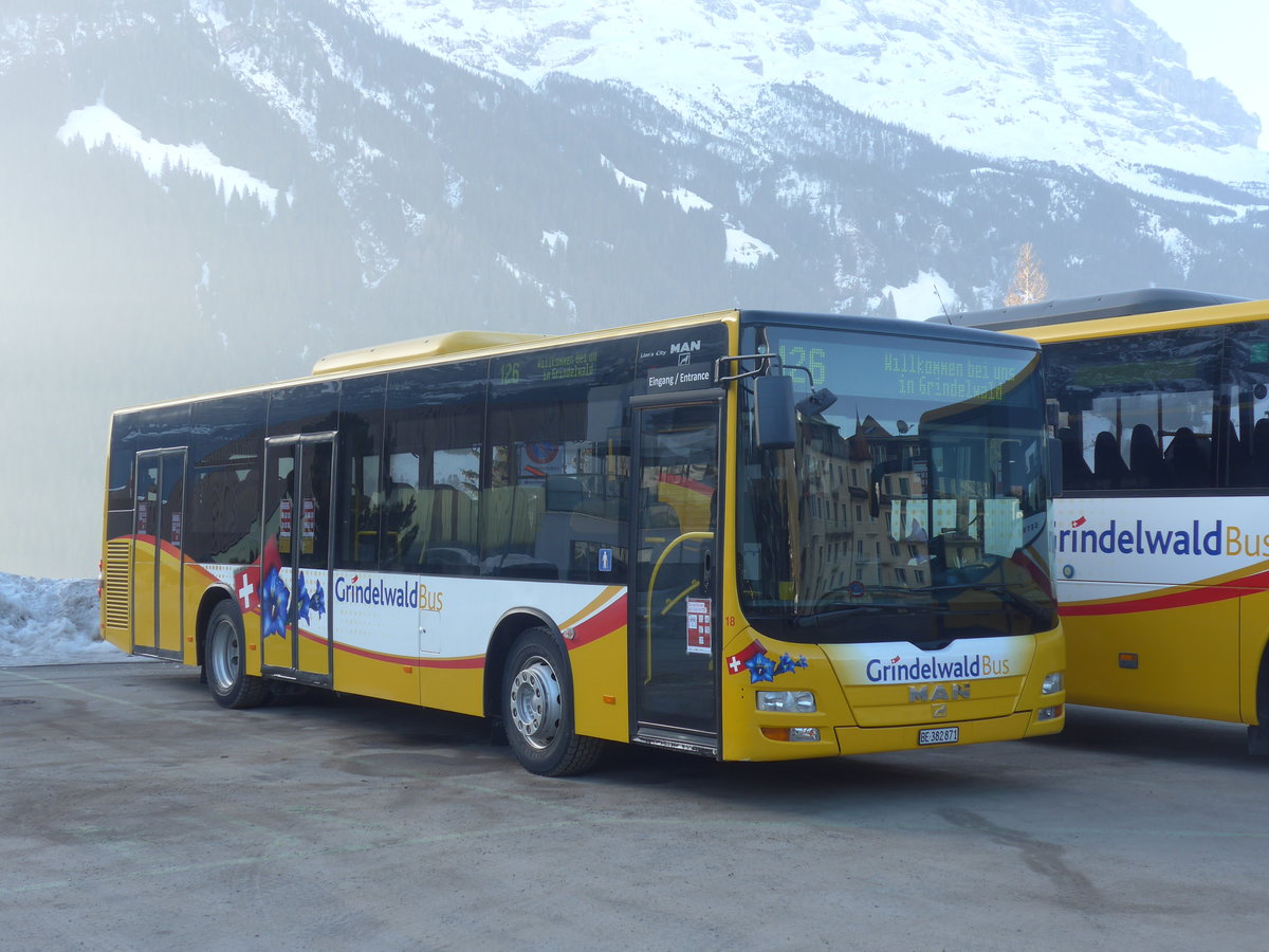 (223'830) - Grindelwaldbus, Grindelwald - Nr. 18/BE 382'871 - MAN/G�ppel am 28. Februar 2021 beim Bahnhof Grindelwald