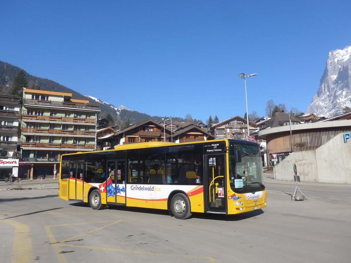 (223'892) - Grindelwaldbus, Grindelwald - Nr. 11/BE 261'865 - MAN/G�ppel am 28. Februar 2021 beim Bahnhof Grindelwald