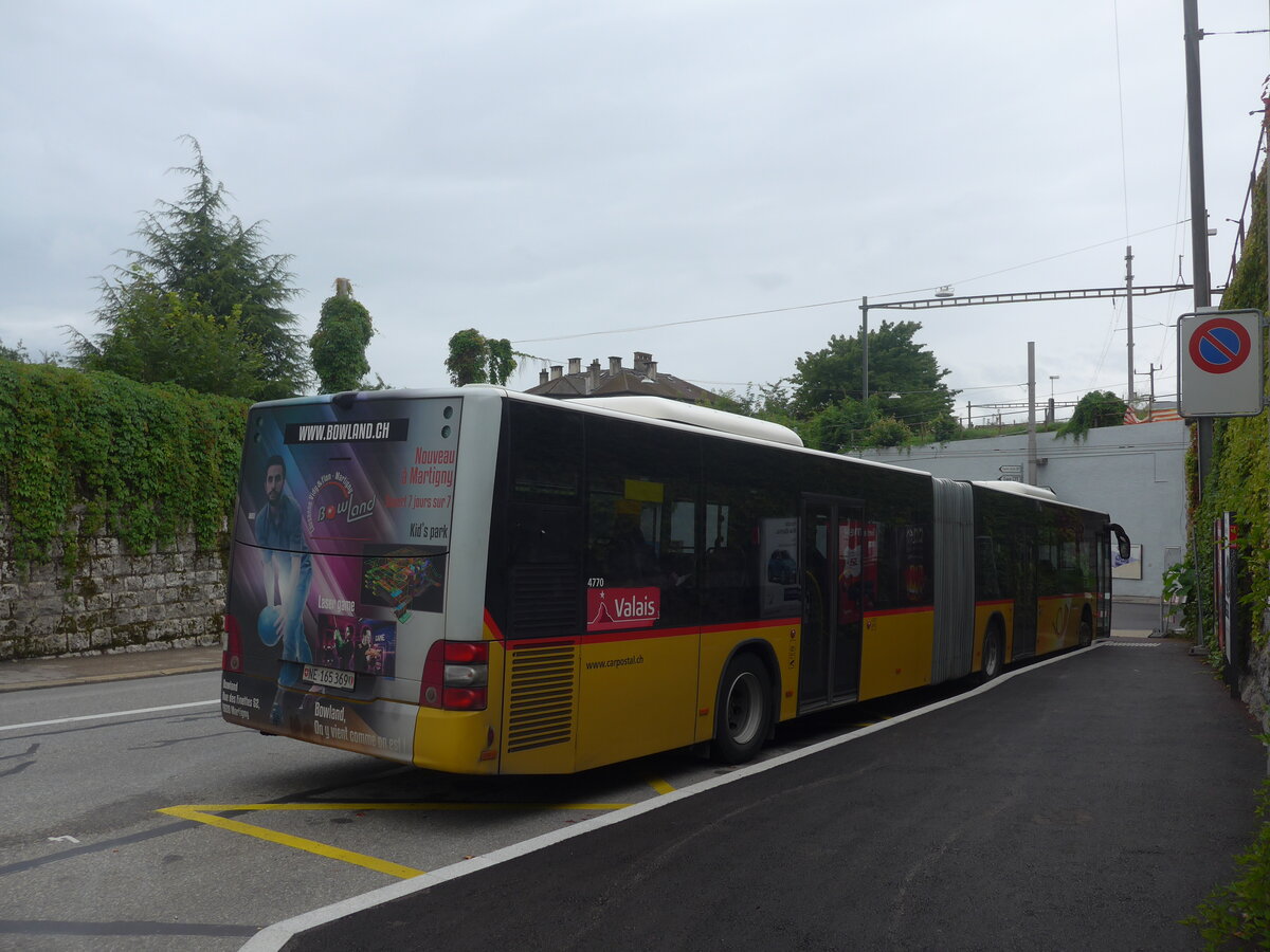 (226'835) - Buchard, Leytron - NE 165'369 - MAN (ex VS 104'346; ex Nr. 160) am 1. August 2021 beim Bahnhof Neuch�tel (Einsatz CarPostal)