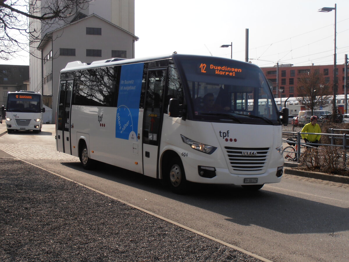 (233'834) - TPF Fribourg - Nr. 604/FR 300'276 - Iveco/ProBus am 12. M�rz 2022 beim Bahnhof D�dingen