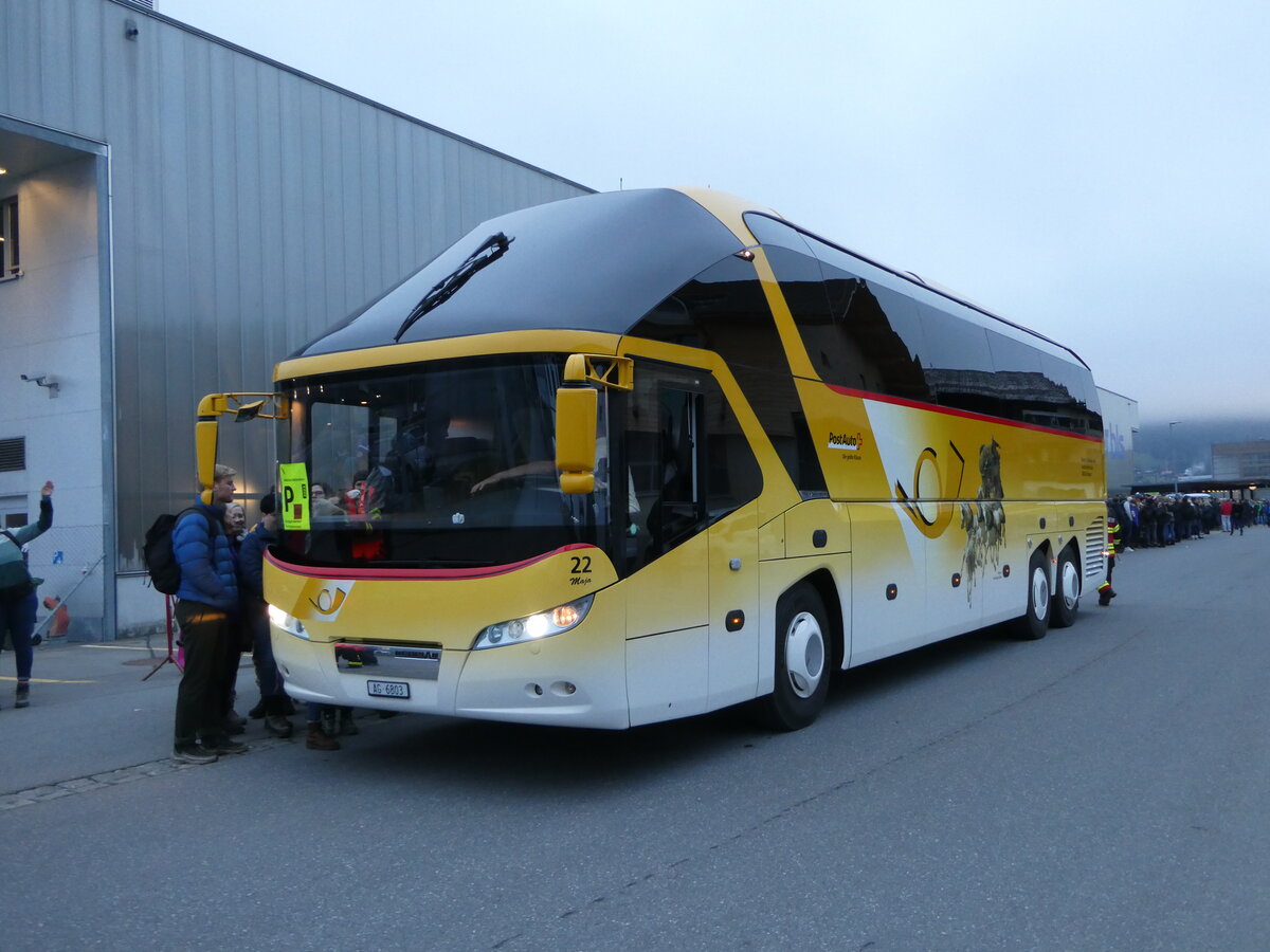 (244'523) - Tschannen, Zofingen - Nr. 22/AG 6803/PID 4706 - Neoplan (ex PostAuto Graub�nden) am 7. Januar 2023 beim Bahnhof Frutigen