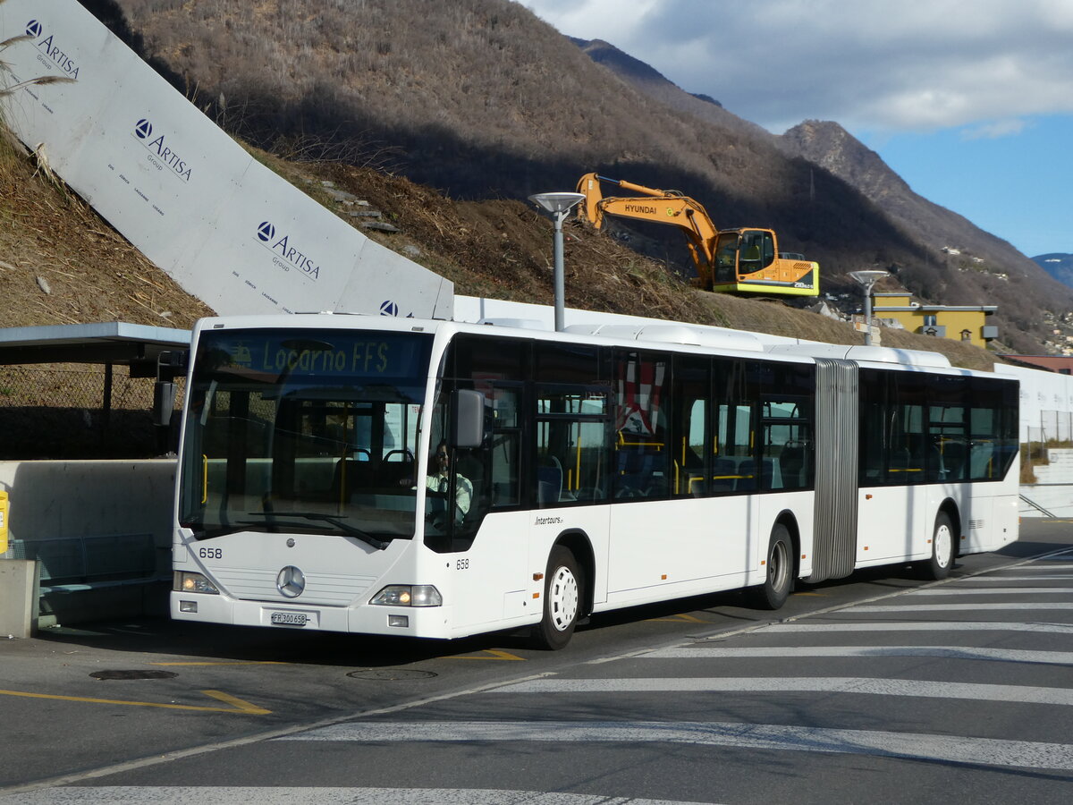 (245'819) - Intertours, Domdidier - Nr. 658/FR 300'658 - Mercedes (ex Nr. 206; ex VZO Gr�ningen Nr. 51) am 4. Februar 2023 beim Bahnhof Tenero