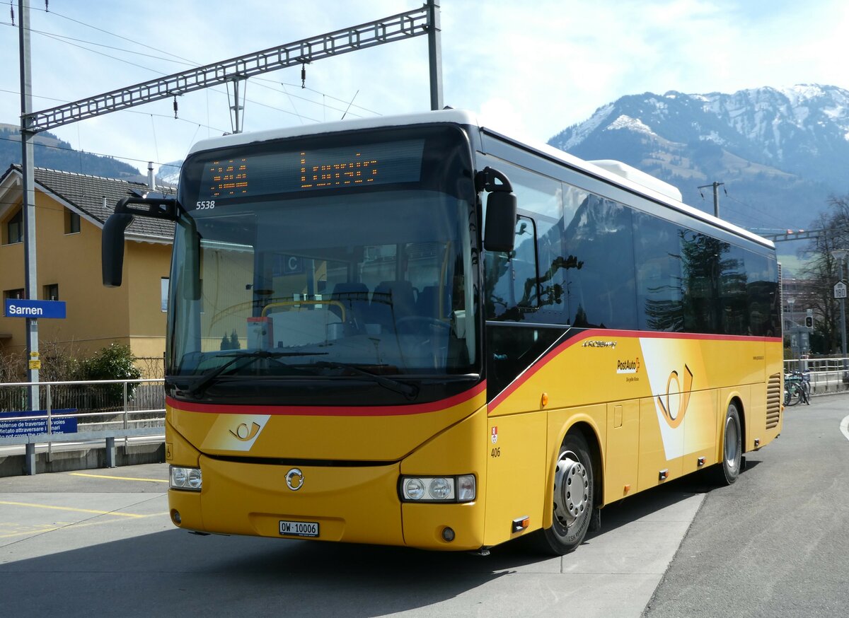 (247'434) - PostAuto Zentralschweiz - Nr. 406/OW 10'006/PID 5538 - Irisbus (ex Nr. 3; ex Dillier, Sarnen Nr. 3) am 18. M�rz 2023 beim Bahnhof Sarnen