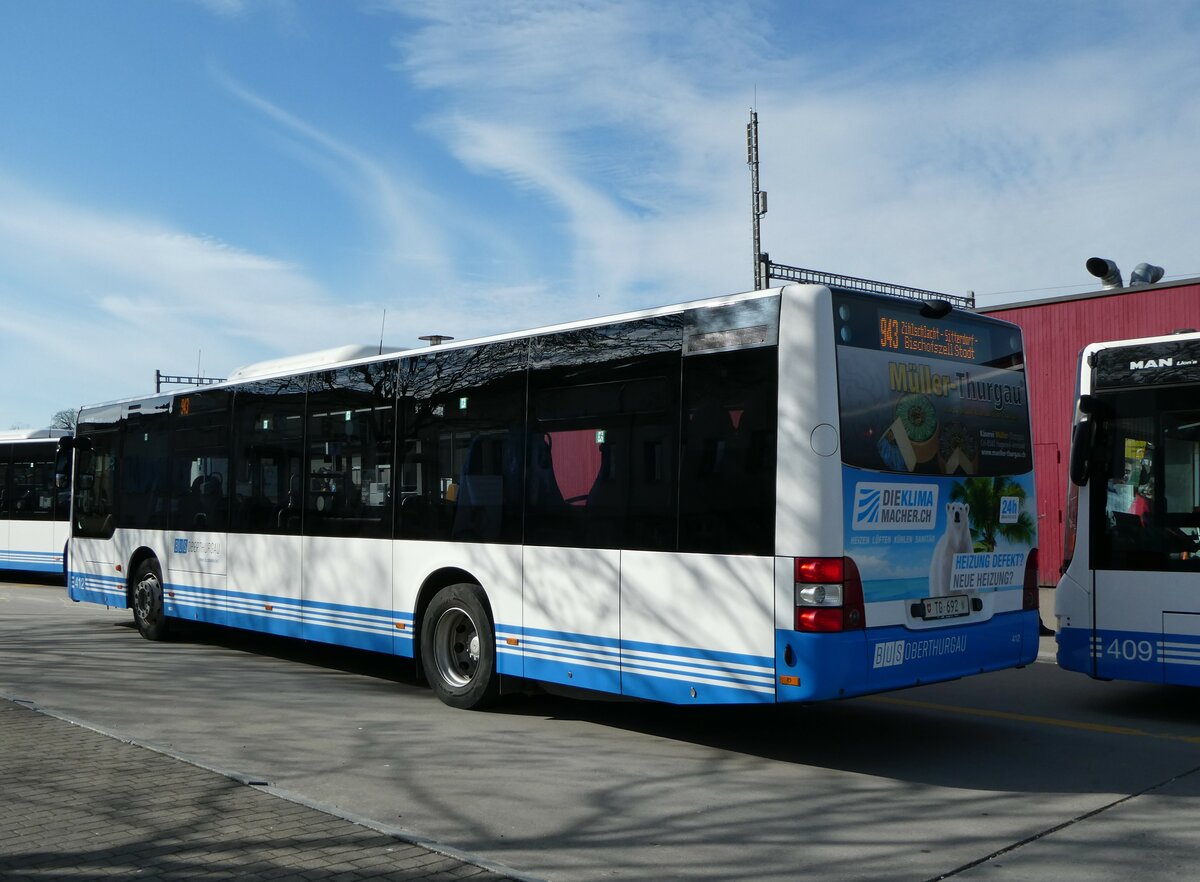(247'824) - BOTG Amriswil - Nr. 412/TG 692 - MAN am 28. M�rz 2023 beim Bahnhof Amriswil