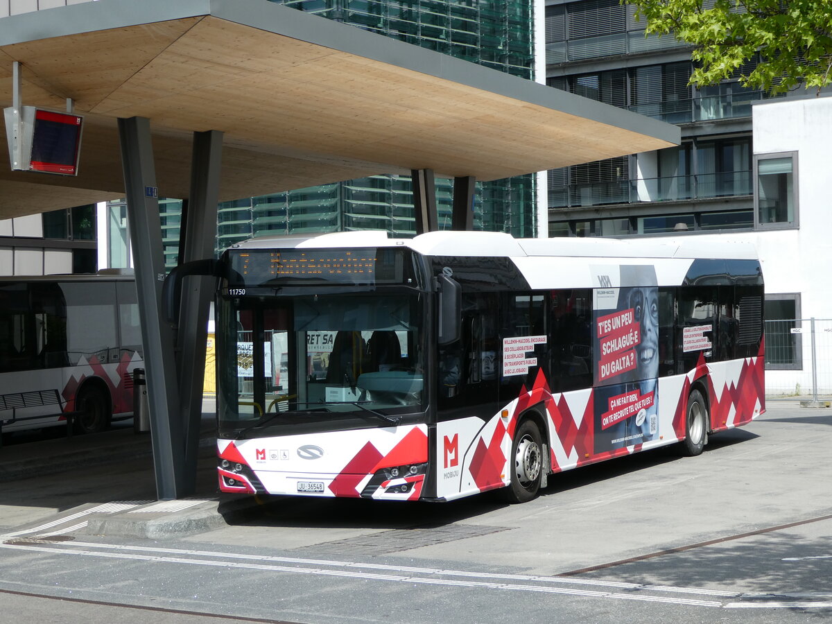 (250'163) - CarPostal Ouest - JU 36'548/PID 11'750 - Solaris am 18. Mai 2023 beim Bahnhof Del�mont