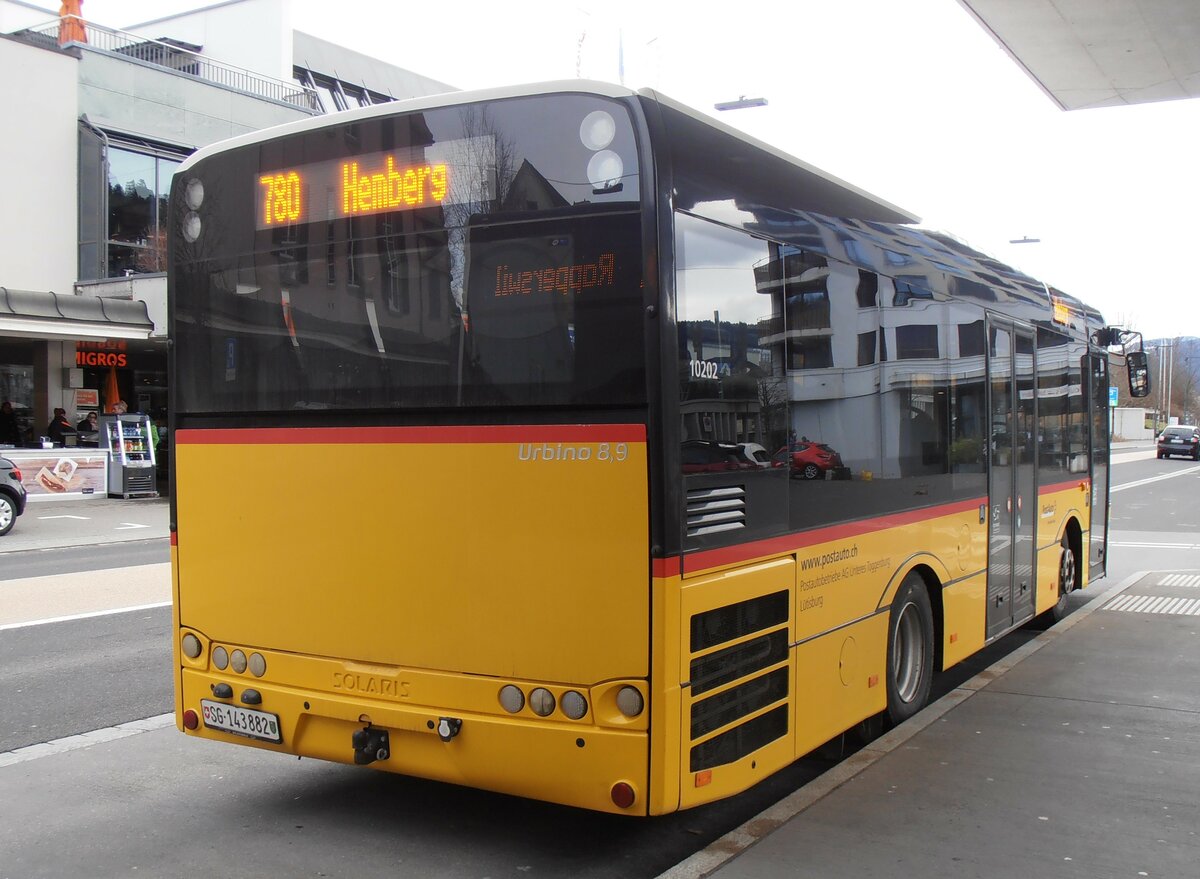 (257'869) - Postautobetriebe Unteres Toggenburg, L�tisburg - SG 143'882/PID 10'202 - Solaris am 23. Dezember 2023 beim Bahnhof Wattwil