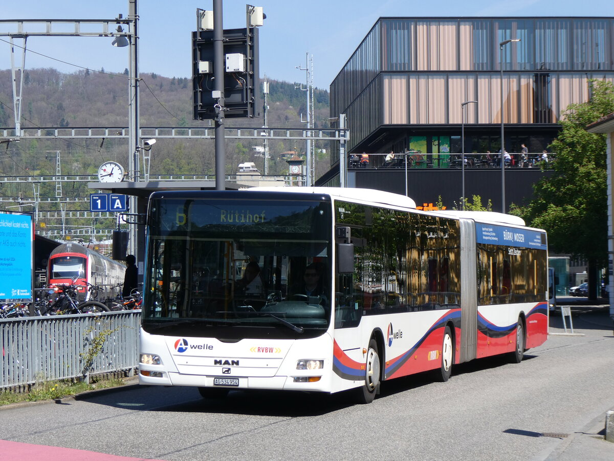 (261'161) - Inderm�hle, Rekingen - Nr. 130/AG 534'954 - MAN (ex RVBW Wettingen Nr. 161) am 12. April 2024 beim Bahnhof Baden