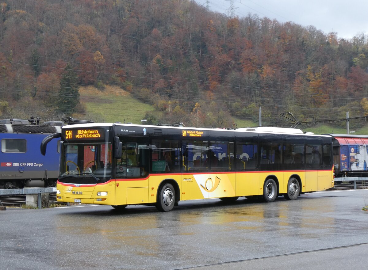 (269'259) - Niederer, Filzbach - Nr. 31/GL 44/PID 10'167 - MAN (ex Schwizer, Goldach; ex Casutt, Gossau) am 19. November 2024 beim Bahnhof Ziegelbr�cke
