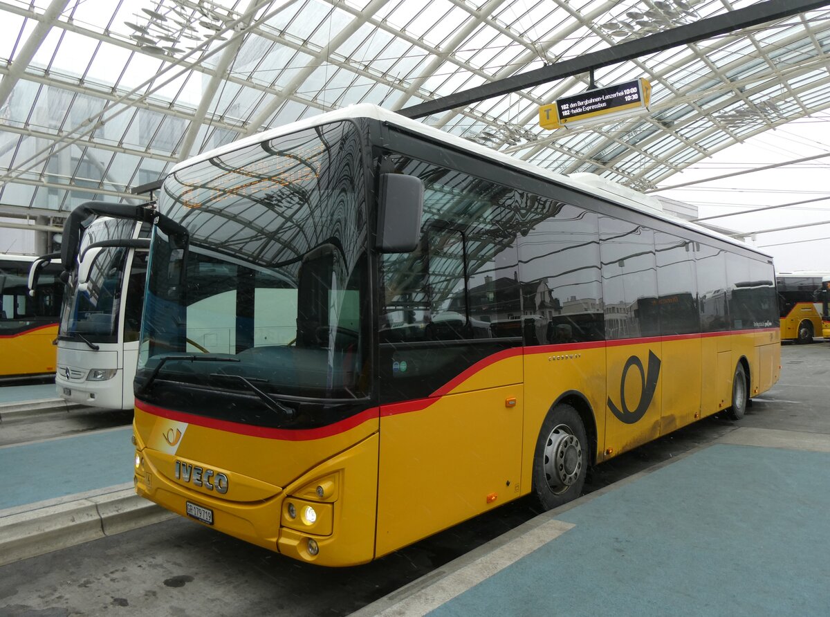 (271'967) - PostAuto Graub�nden - GR 179'719/PID 11'409 - Iveco am 14. Februar 2025 in Chur, Postautostation