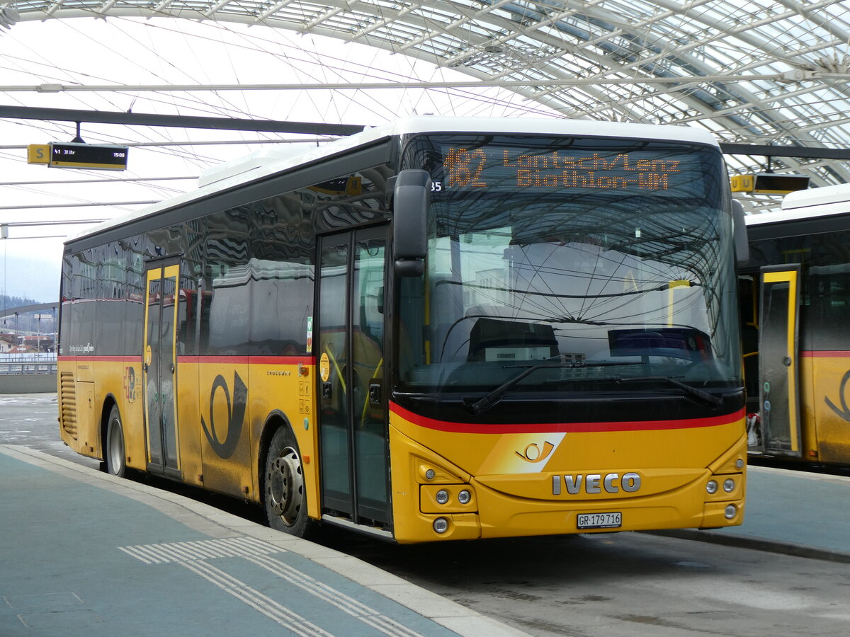 (272'056) - PostAuto Graub�nden - GR 179'716/PID 11'285 - Iveco am 14. Februar 2025 in Chur, Postautostation