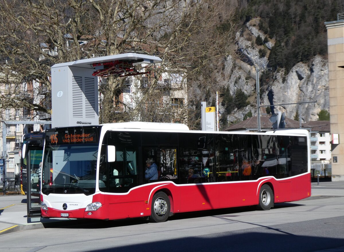 (273'085) - PostAuto Bern - BE 707'874/PID 12'319 - MAN (ex Wiener Linien, A-Wien Nr. 8163) am 20. M�rz 2025 beim Bahnhof Interlaken West