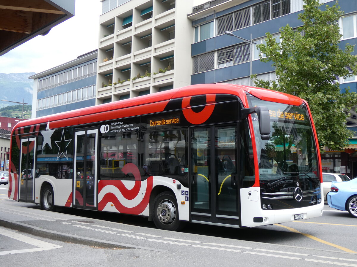 (276'325) - PostAuto Wallis - VS 574'958/PID 12'150 - eMercedes am 6. Juni 2025 beim Bahnhof Sion