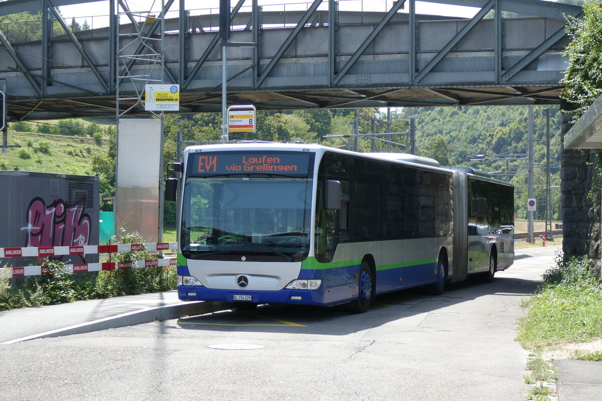 (278'821) - PostAuto Nordschweiz - BL 154'229/PID 12'420 - Mercedes (ex TPL Lugano Nr. 404) am 14. August 2025 beim Bahnhof Aesch