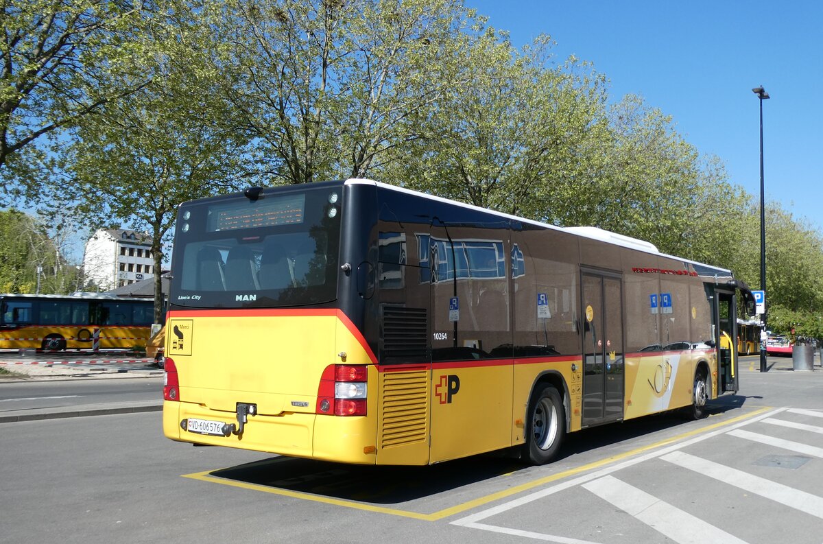 (286'363) - CarPostal Ouest - VD 606'576/PID 10'264 - MAN (ex TSPG Saignel�gier) am 15. April 2026 beim Bahnhof Yverdon