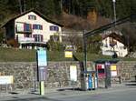 (230'041) - PostAuto-Haltestelle am 6. November 2021 beim Bahnhof Tiefencastel